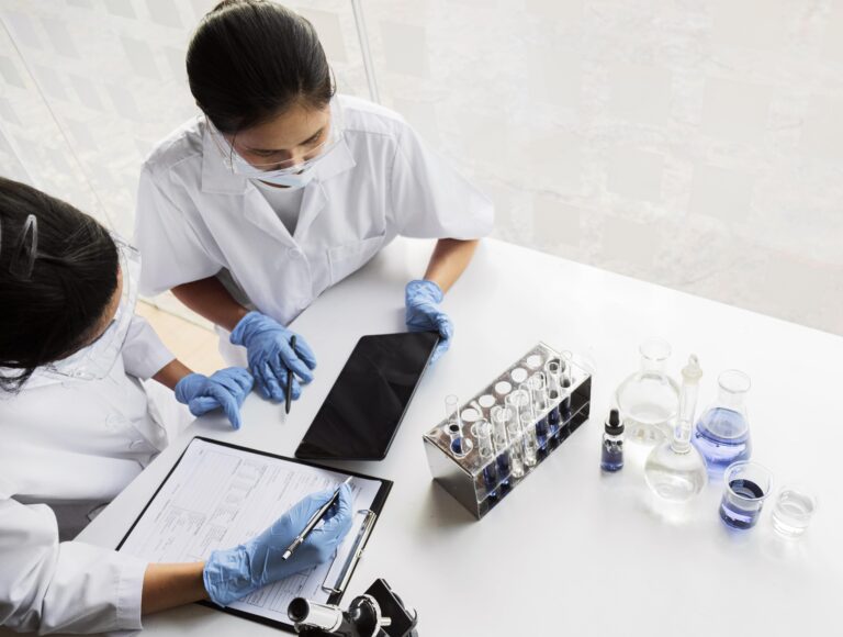 Laboratory technicians collecting data from clinical trials.